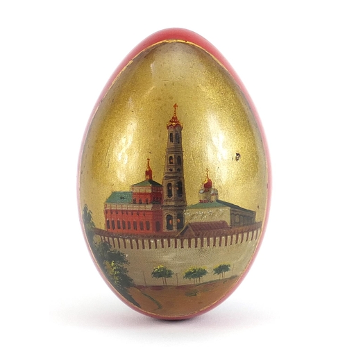 382 - Lukutin, Imperial Russian lacquered Easter egg hand painted with Archangel Mikhail, 7cm high