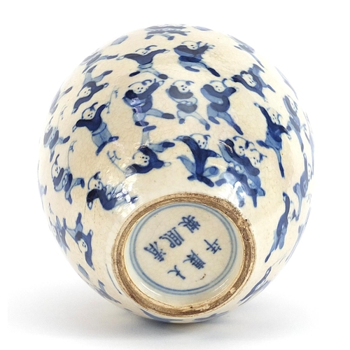 222 - Chinese blue and white porcelain tea caddy hand painted with acrobats, six figure character marks to... 