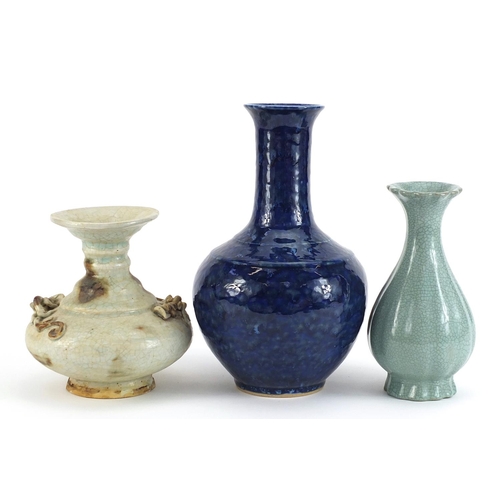 282 - Three Chinese porcelain vases including one having a blue glaze, the largest 25cm high