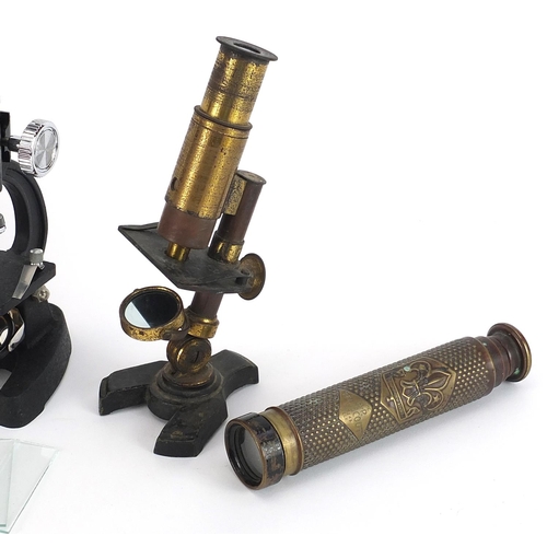 714 - Optical items including a Boy Scouts Teliscout two draw brass telescope and two adjustable microscop... 