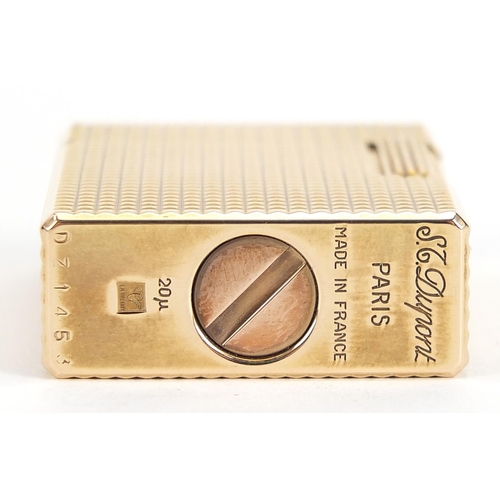 126 - S J Dupont gold plated pocket lighter with crocodile effect protective case, box and booklet, the li... 