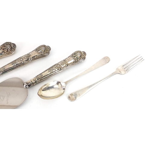 2258 - Silver items comprising teaspoon, fork, two silver handled bread knives and a silver handled cake sl... 