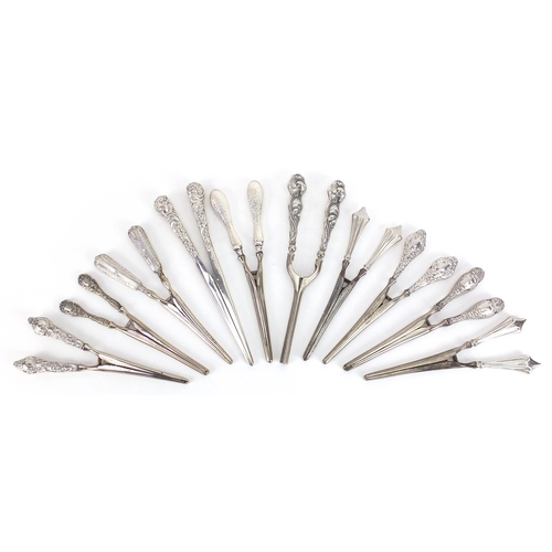 2256 - Ten pairs of Victorian and later silver handled glove stretchers including one pair all silver, vari... 