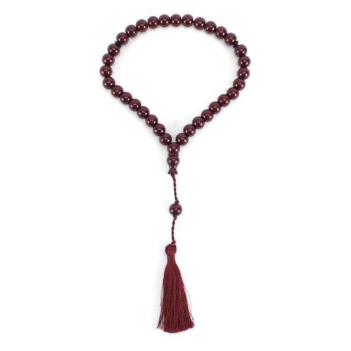 991 - Islamic cherry amber coloured bead prayer necklace, 42cm in length