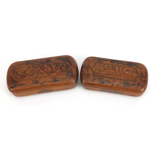 199 - Pair of Islamic treen snuff boxes with calligraphy and flowers, each 11cm wide