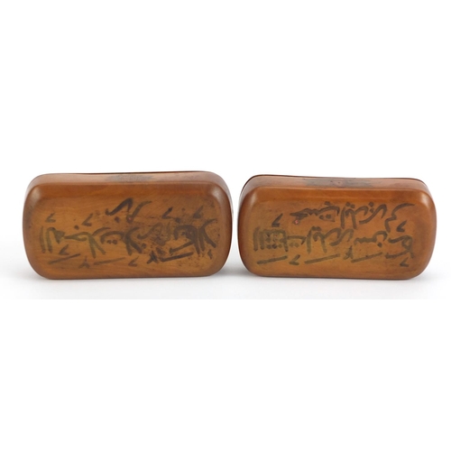 199 - Pair of Islamic treen snuff boxes with calligraphy and flowers, each 11cm wide