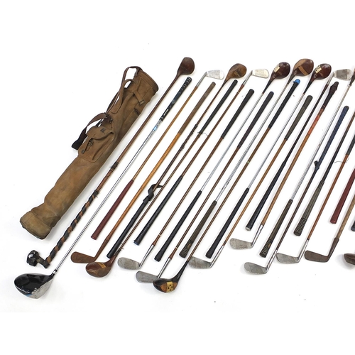 1487A - Collection of antique and later golf clubs, some with wooden shafts including R J Shoesmith, H J Lan... 