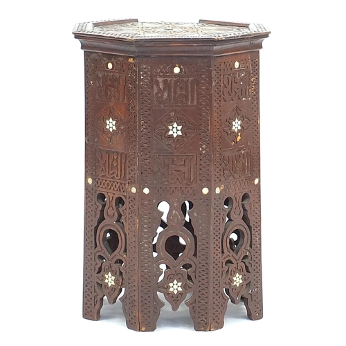 793 - Manner of Liberty & Co octagonal Moorish style  occasional table with mother of pearl inlay, carved ... 