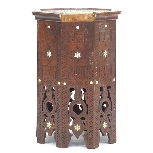 793 - Manner of Liberty & Co octagonal Moorish style  occasional table with mother of pearl inlay, carved ... 