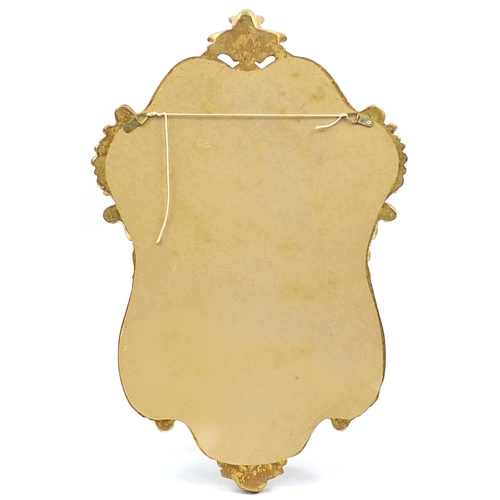 811 - Gilt framed cartouche shaped wall mirror, 98cm x 64cm