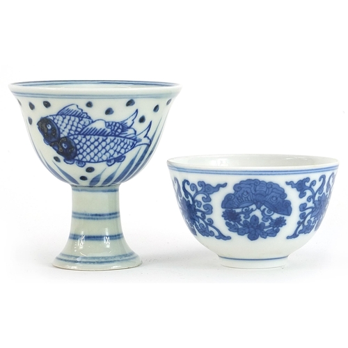 745 - Chinese blue and white porcelain stem cup hand painted with fish and a blue and white tea bowl, the ... 