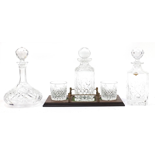 1031 - Stuart Crystal decanter and two tumblers on tray together with two Edinburgh Crystal decanters with ... 