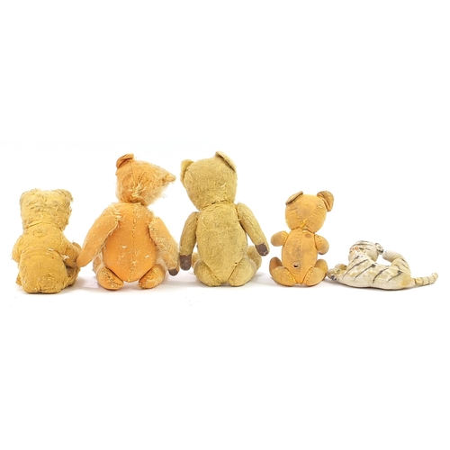 1353 - Four antique golden teddy bears with jointed limbs and a tiger, possibly Steiff, the largest 41cm hi... 