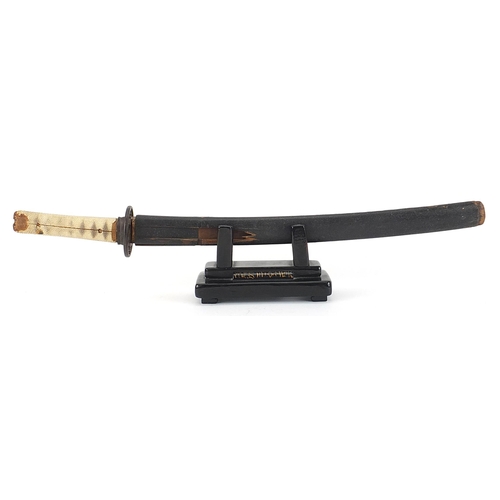 2349 - Japanese Wakisashi with shagreen grip, iron tsuba and lacquered scabbard, the handle signed with cha... 