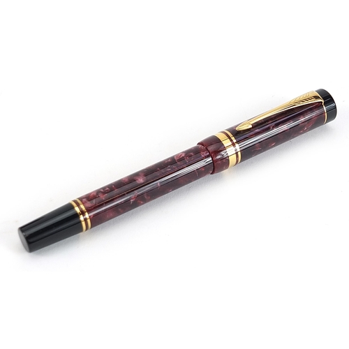 100 - Parker Duofold red marbleised fountain pen with 18k gold nib, case and box