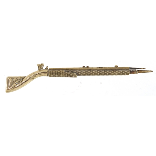 193 - Novelty silver plated propelling pencil in the form of a rifle with bayonet, 9.5cm in length