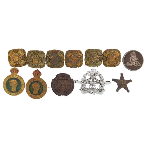 2314 - Militaria including silver and tortoiseshell brooch and Women's Land Army brooch