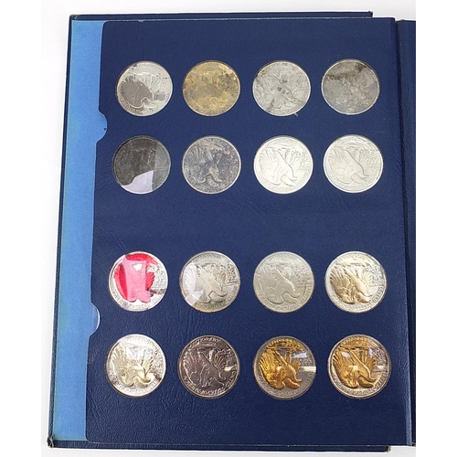 1619 - American coinage including Liberty Walking halves arranged in two unassociated albums and 1993 one o... 