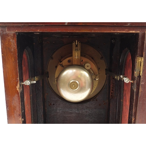 297 - Inlaid mahogany bracket clock with columns and visible Brocot escapement, the circular enamelled cha... 