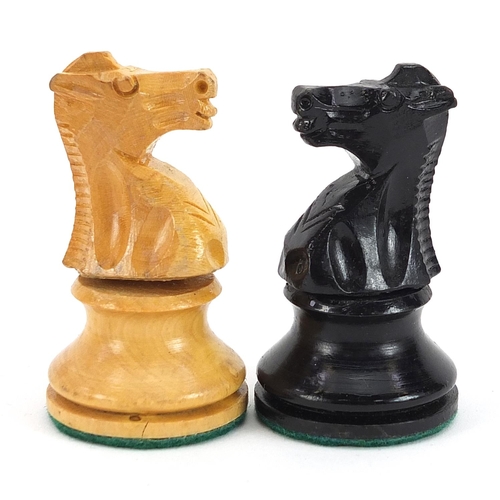 1367 - Jaques style boxwood and ebonised Staunton pattern chess set with weighted bases, the largest pieces... 