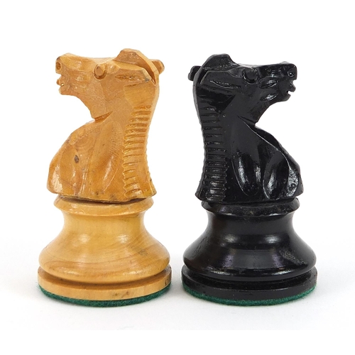 1367 - Jaques style boxwood and ebonised Staunton pattern chess set with weighted bases, the largest pieces... 