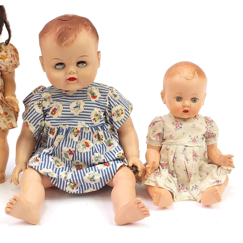 1337 - Five vintage dolls including three Rosebud examples, the largest 49cm high