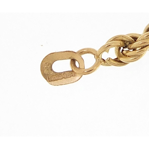 1873 - 9ct gold necklace with T bar, initial S pendant and a 9ct gold rope twist bracelet, the necklace 46c... 