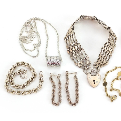 2124 - Costume jewellery, some silver including a five row gate bracelet and rope twist bracelet with match... 