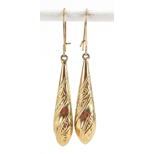 2104 - Two pairs of 9ct gold drop earrings including a pair set with garnets, the largest 4.2cm high, total... 