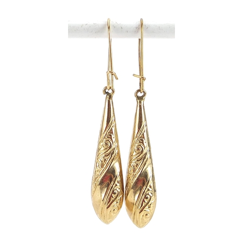 2104 - Two pairs of 9ct gold drop earrings including a pair set with garnets, the largest 4.2cm high, total... 