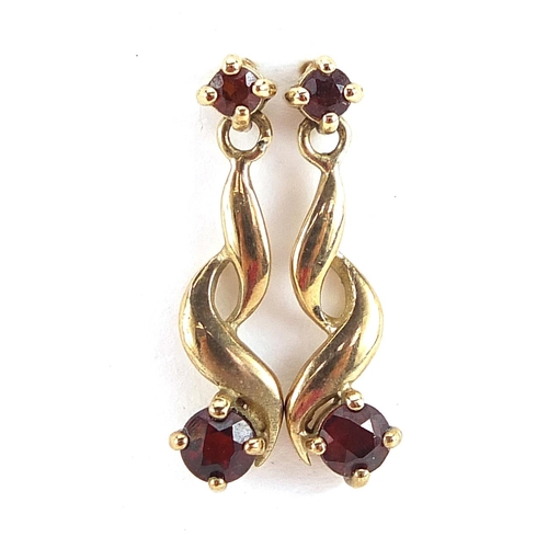 2104 - Two pairs of 9ct gold drop earrings including a pair set with garnets, the largest 4.2cm high, total... 