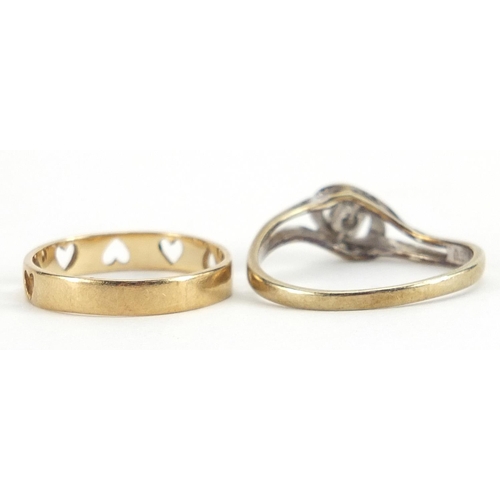 1943 - Two 9ct gold rings, one set with a diamond, the other pierced with love hearts, sizes I and L, 2.8g