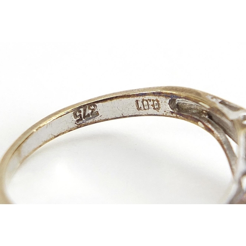 1943 - Two 9ct gold rings, one set with a diamond, the other pierced with love hearts, sizes I and L, 2.8g