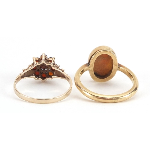 1930 - Two 9ct gold rings comprising cameo maiden head, size P/Q and 9ct gold garnet flower head ring, size... 