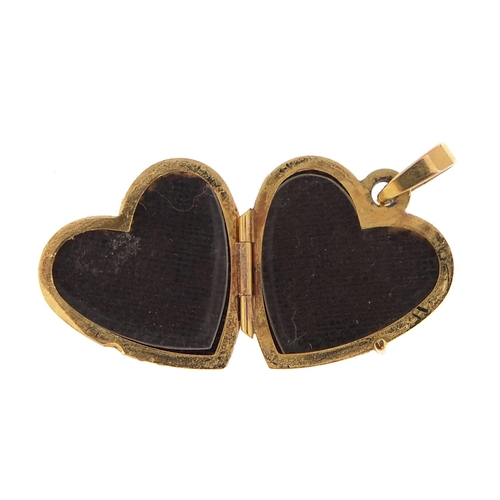 1876 - 9ct two tone gold love heart locket engraved with flowers, 2.1cm high, 1.6g