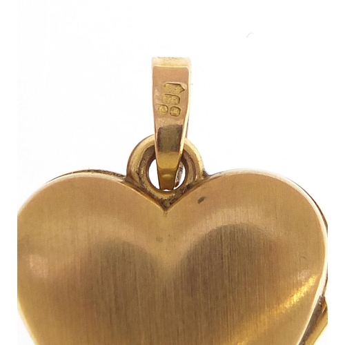 1876 - 9ct two tone gold love heart locket engraved with flowers, 2.1cm high, 1.6g