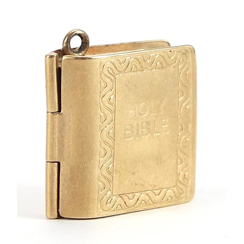 2003 - 9ct gold holy bible charm opening to reveal folding pages, 1.4cm high, 2.2g