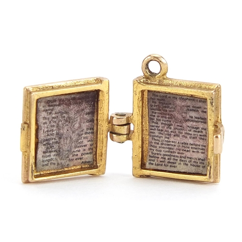 1896 - Two 9ct gold charms comprising church and bible, each 1.5cm high, total 5.0g