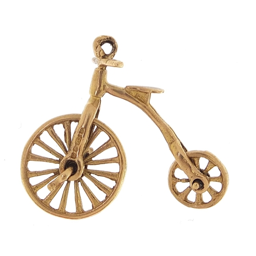 1701 - 9ct gold penny farthing charm, 2.5cm in length, 2.3g