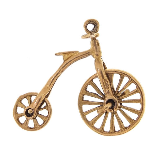 1701 - 9ct gold penny farthing charm, 2.5cm in length, 2.3g