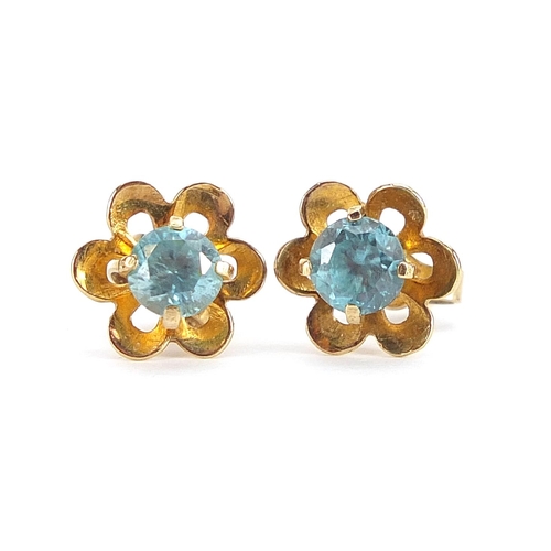 2019 - Pair of 14ct gold blue stone flower head earrings, possibly aquamarine, 1cm in diameter, 1.7g