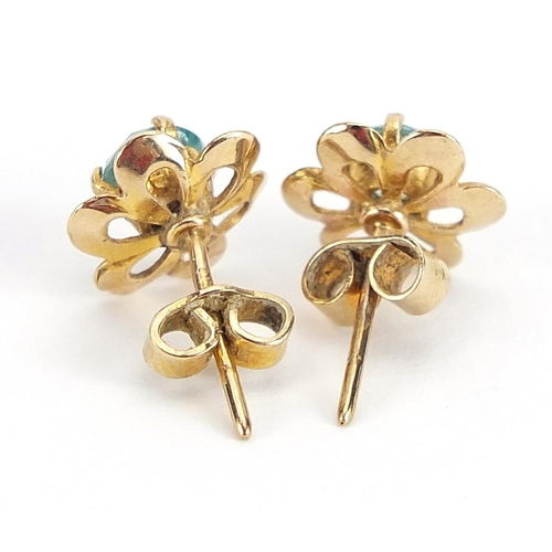 2019 - Pair of 14ct gold blue stone flower head earrings, possibly aquamarine, 1cm in diameter, 1.7g