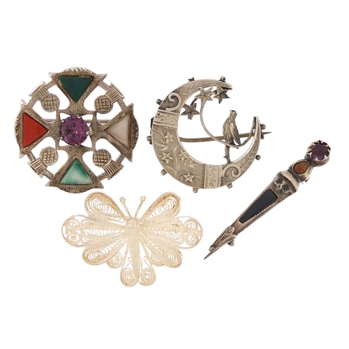 2002 - Four antique and later silver brooches including Scottish hardstone and amethyst and a Victorian aes... 