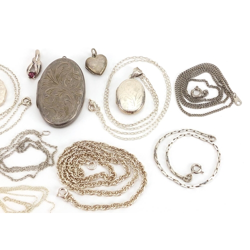 2091 - Silver jewellery comprising four lockets, two pendants and eight necklaces, 53.2g