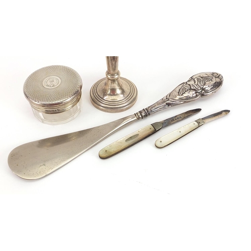 2260 - Silver objects including trumpet shaped bud vase, two mother of pearl flanked folding fruit knives a... 