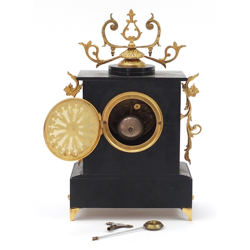 958 - Victorian black slate and red marble striking mantle clock with gilt metal mounts and enamelled dial... 