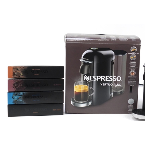 617 - Nespresso Vertuo Plus coffee machine with box and four packets of pods