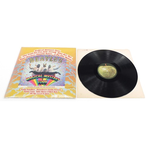 1399 - Four Magical Mystery Tour vinyl LP records by The Beatles, three with twenty four page colour pictur... 