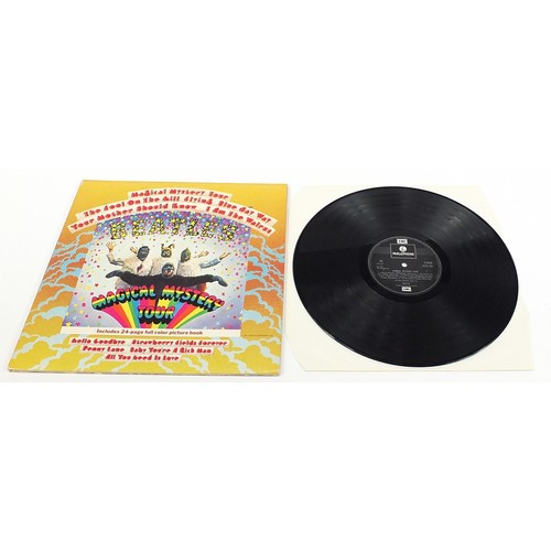 1399 - Four Magical Mystery Tour vinyl LP records by The Beatles, three with twenty four page colour pictur... 