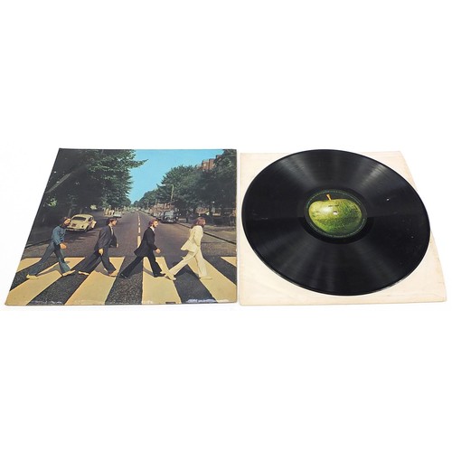 1394 - Five Abbey Road vinyl LP records by The Beatles, four PCS7088 and one French pressing